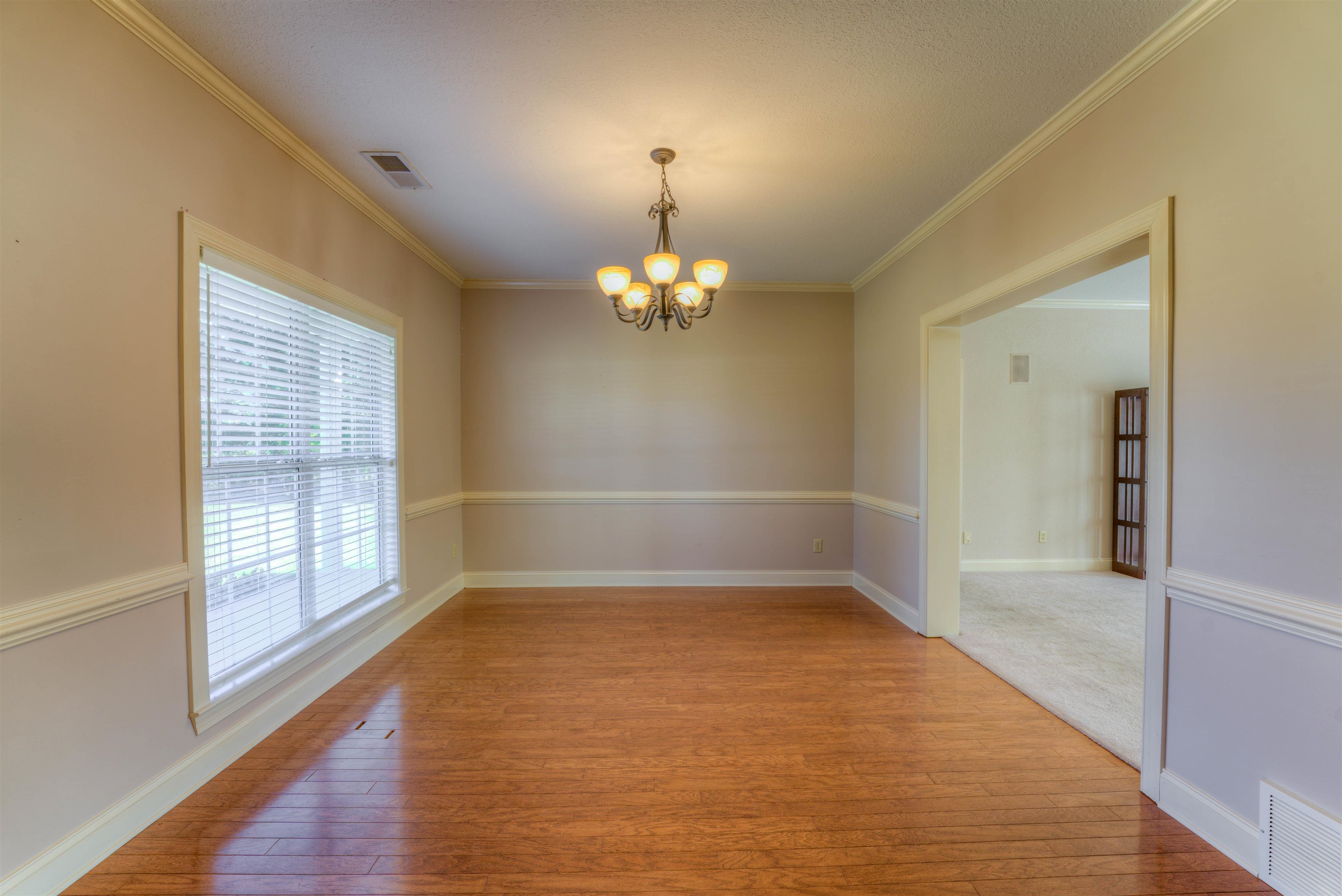 10529 Moose Road Millington, TN 38053 - Photo 26 of 40 wooden floor in an empty room with a window