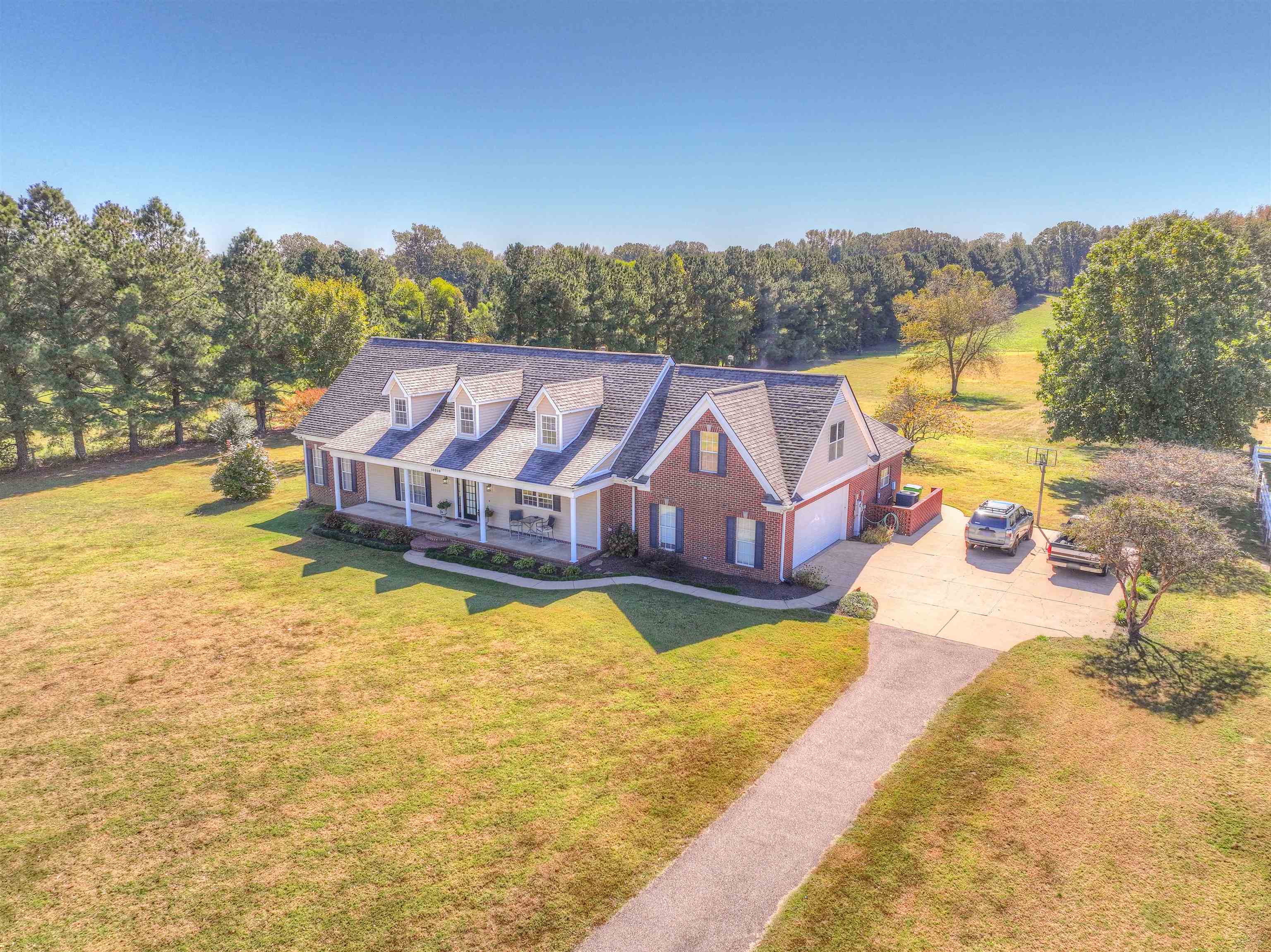 10529 Moose Road Millington, TN 38053 - Photo 3 of 40 a view of a swimming pool with an ocean view
