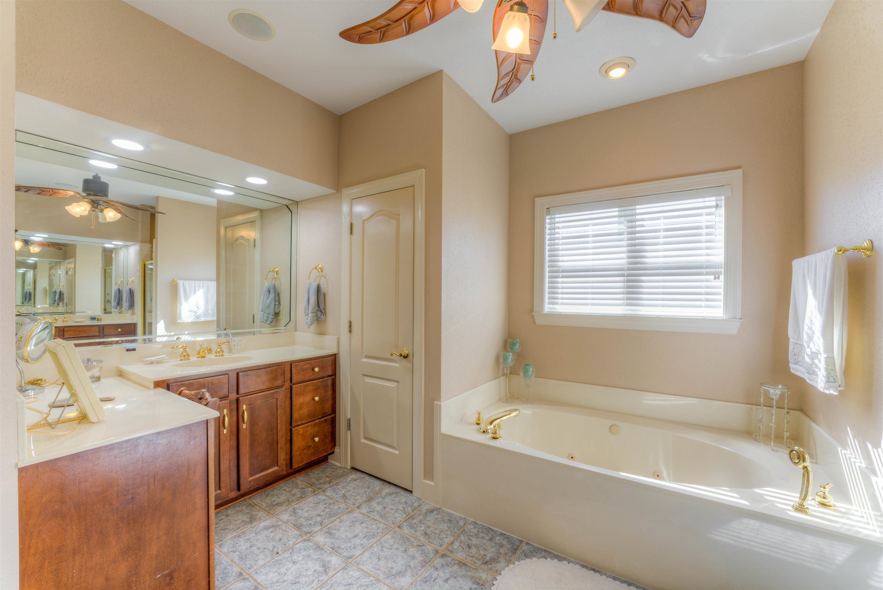 10529 Moose Road Millington, TN 38053 - Photo 33 of 40 a large spacious bathroom with a large tub shower and sink