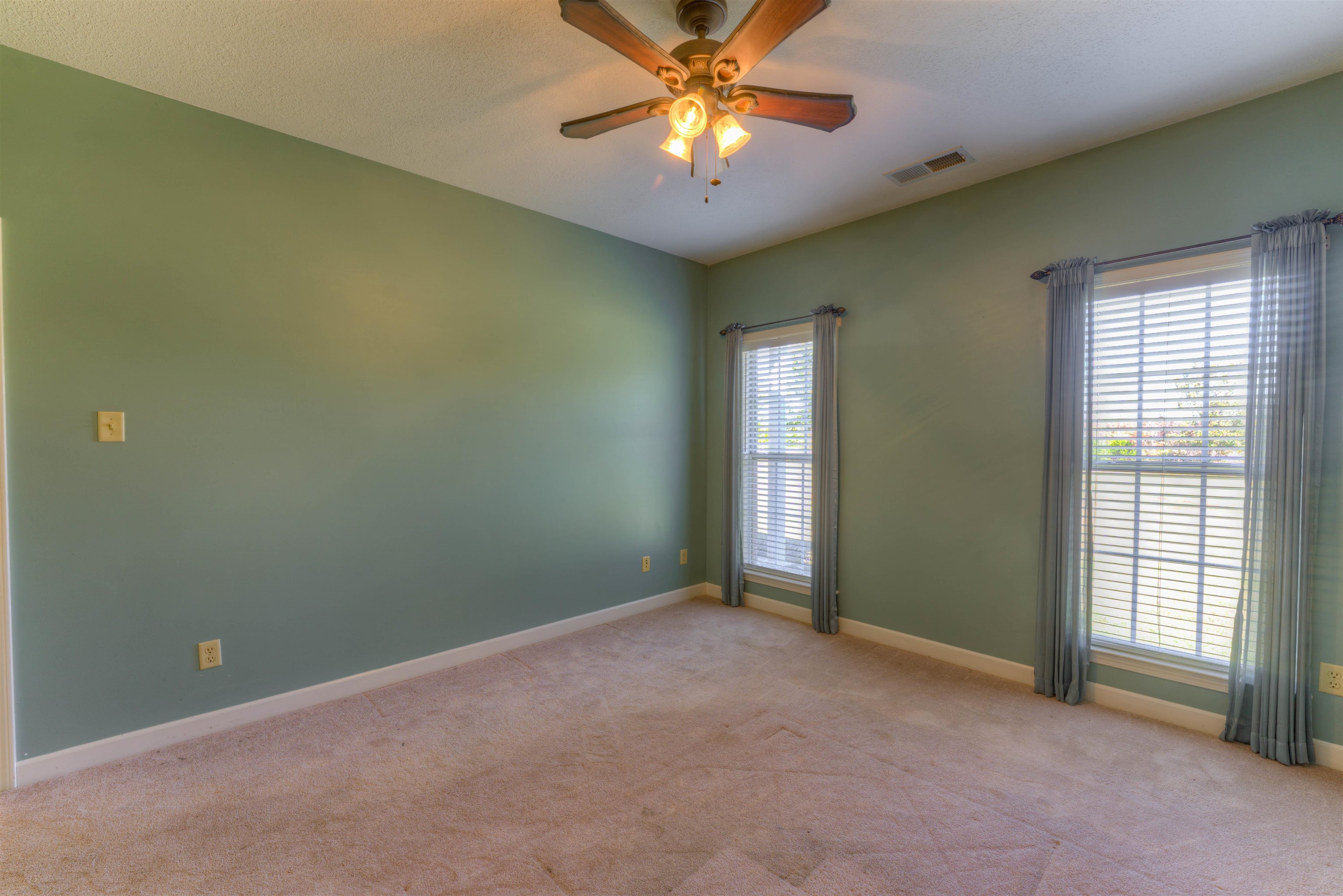 10529 Moose Road Millington, TN 38053 - Photo 35 of 40 an empty room with windows and fan