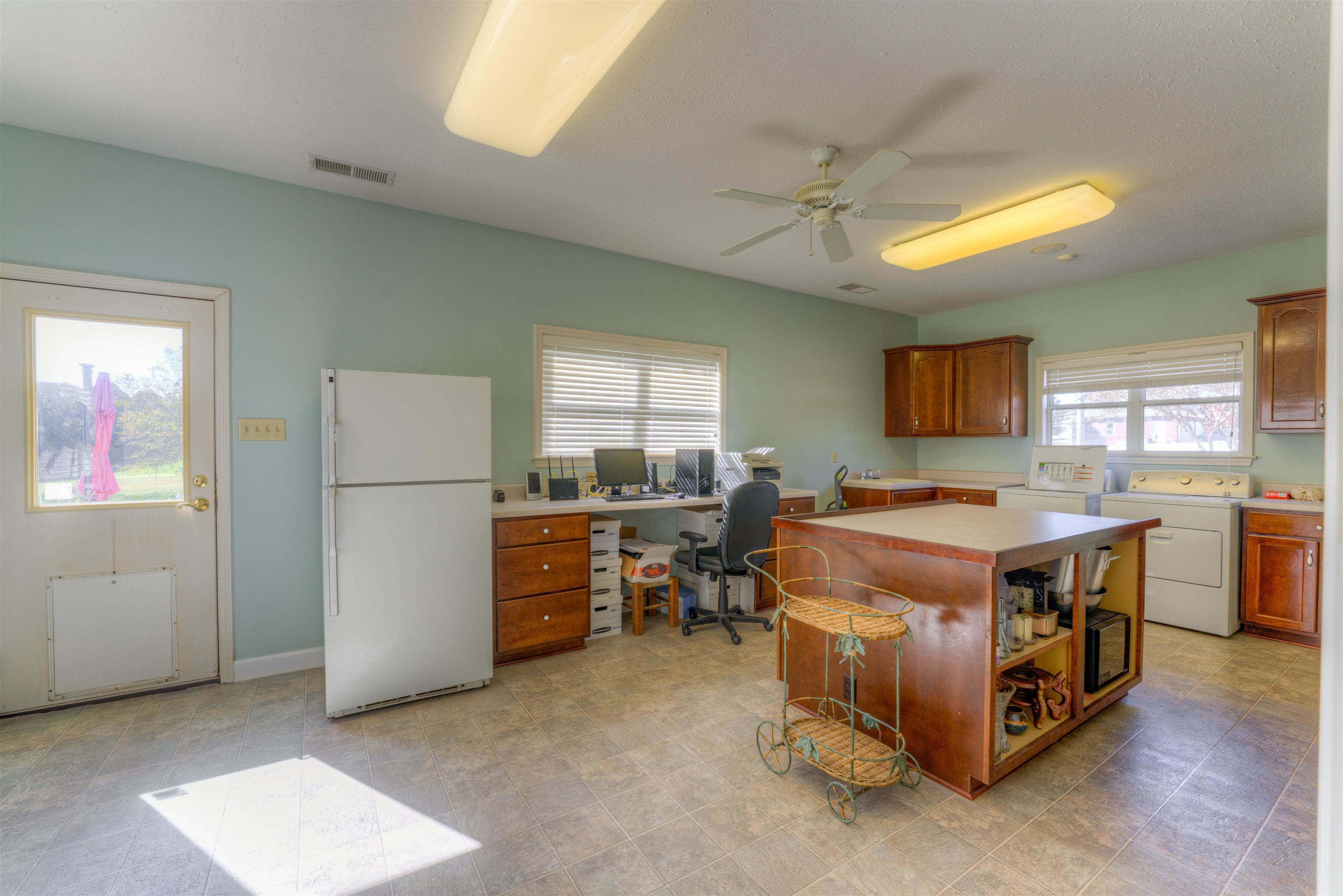 10529 Moose Road Millington, TN 38053 - Photo 38 of 40 a large kitchen with a stove and a refrigerator