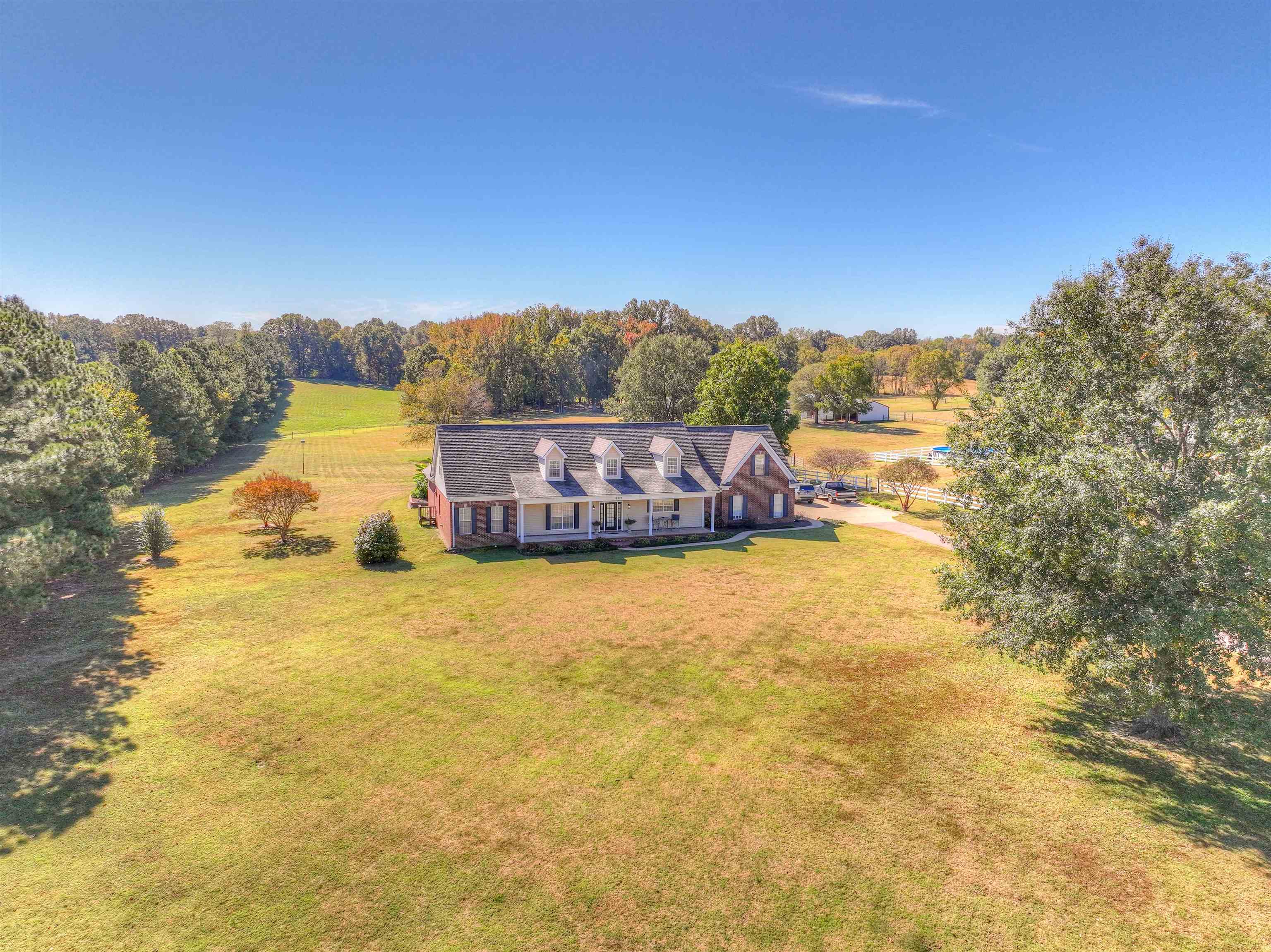 10529 Moose Road Millington, TN 38053 - Photo 4 of 40 a swimming pool with trees in the background