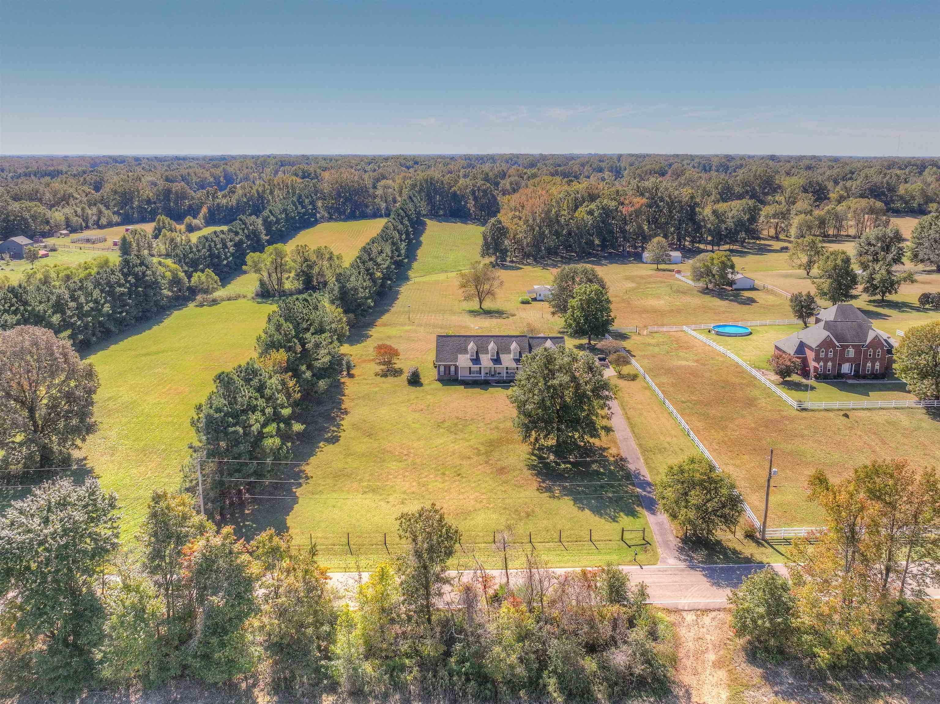 10529 Moose Road Millington, TN 38053 - Photo 5 of 40 a view of a swimming pool with a yard