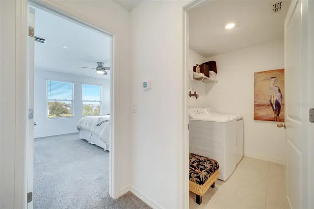 a bedroom with a bed and a view of bathroom