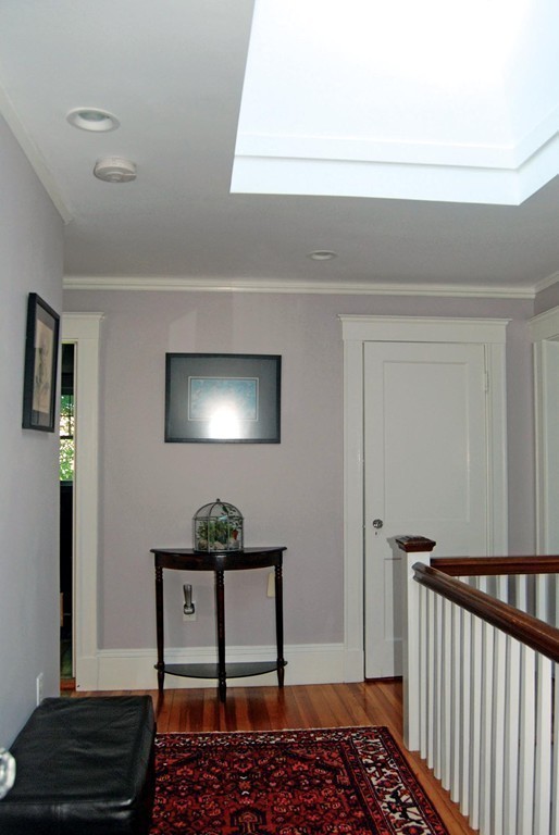 69 Winthrop Road, Unit 69 Brookline, MA 02445 - Photo 12 of 14 a bedroom with a bed and a window