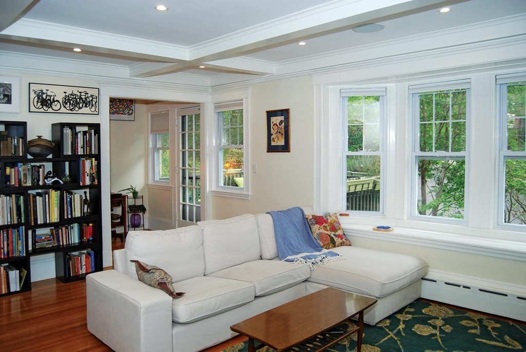 69 Winthrop Road, Unit 69 Brookline, MA 02445 - Photo 3 of 14 a living room with furniture and a large window