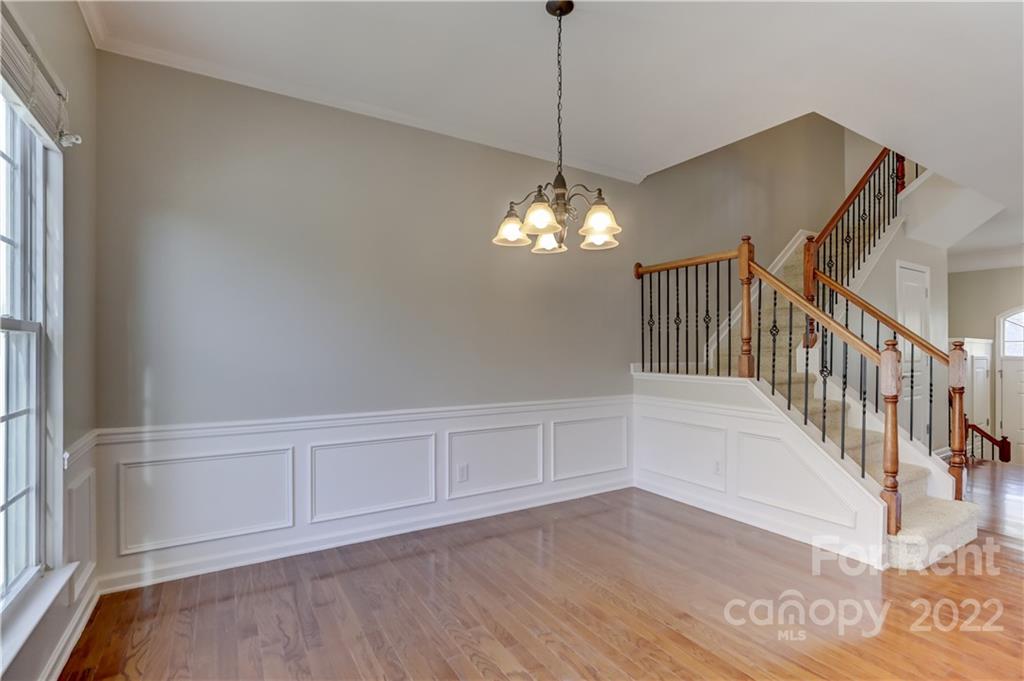 562 6th Baxter Crossing Fort Mill, SC 29708 - Photo 14 of 48 a view of an entryway with wooden floor