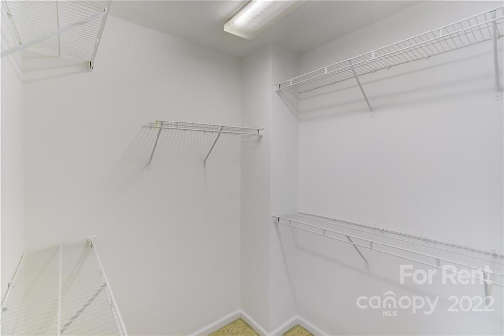 562 6th Baxter Crossing Fort Mill, SC 29708 - Photo 26 of 48 a view of a room with racks on the wall
