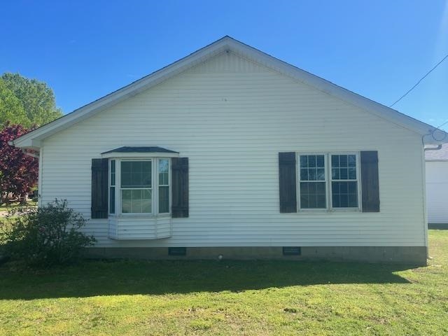1347 Becton William Road Ripley, TN 38063 - Photo 6 of 24 View of side of property featuring crawl space and a lawn