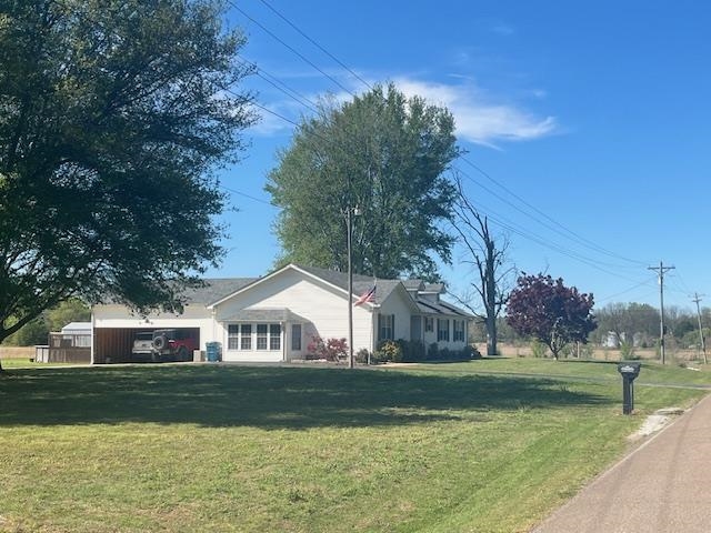 1347 Becton William Road Ripley, TN 38063 - Photo 8 of 24 View of side of property with a yard