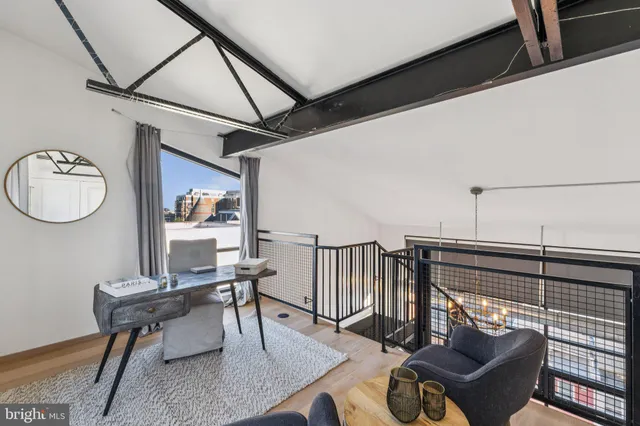 a view of a livingroom with furniture and a couch