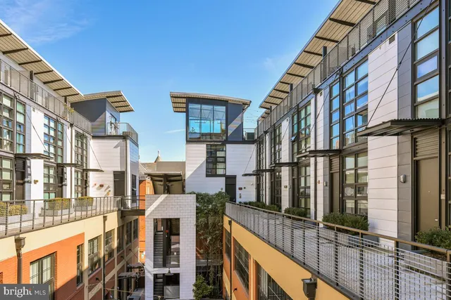 a city street lined with tall buildings