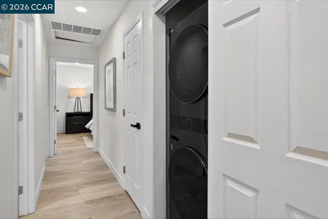 a view of a bathroom from the hallway