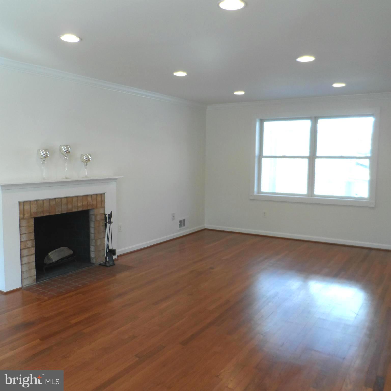 6607 Huntsman Boulevard Springfield, VA 22152 - Photo 2 of 30 WBFP and refinished Oak wood floors