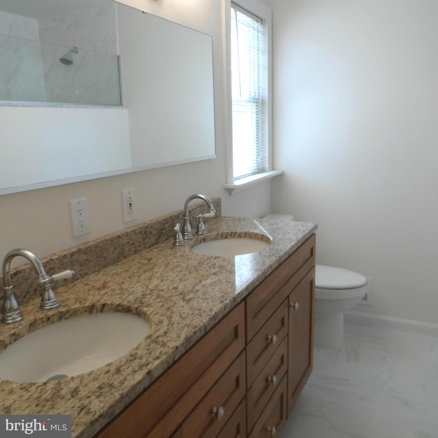 6607 Huntsman Boulevard Springfield, VA 22152 - Photo 18 of 30 Double Vanity with Granite