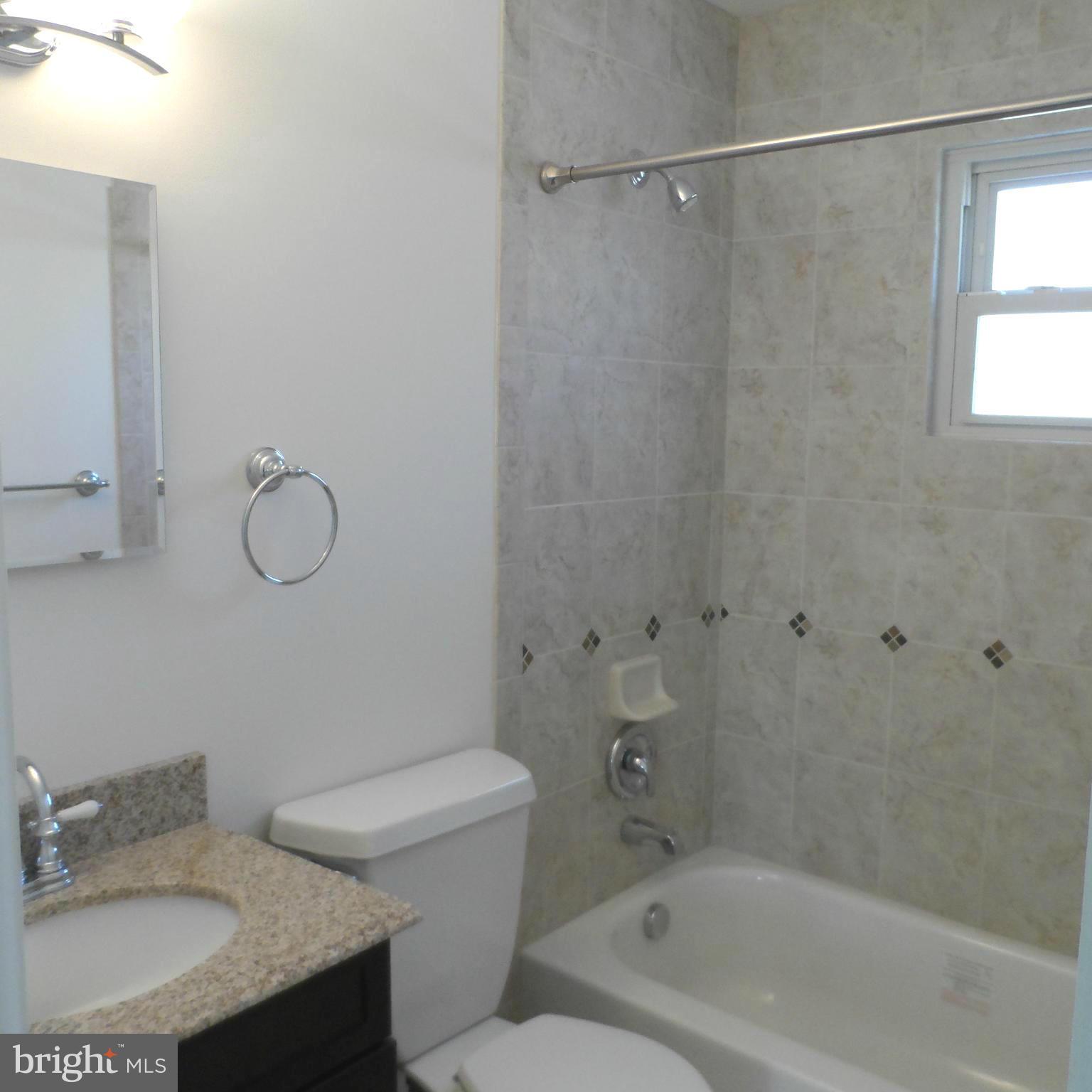 6607 Huntsman Boulevard Springfield, VA 22152 - Photo 21 of 30 Main Bath with New Fixtures