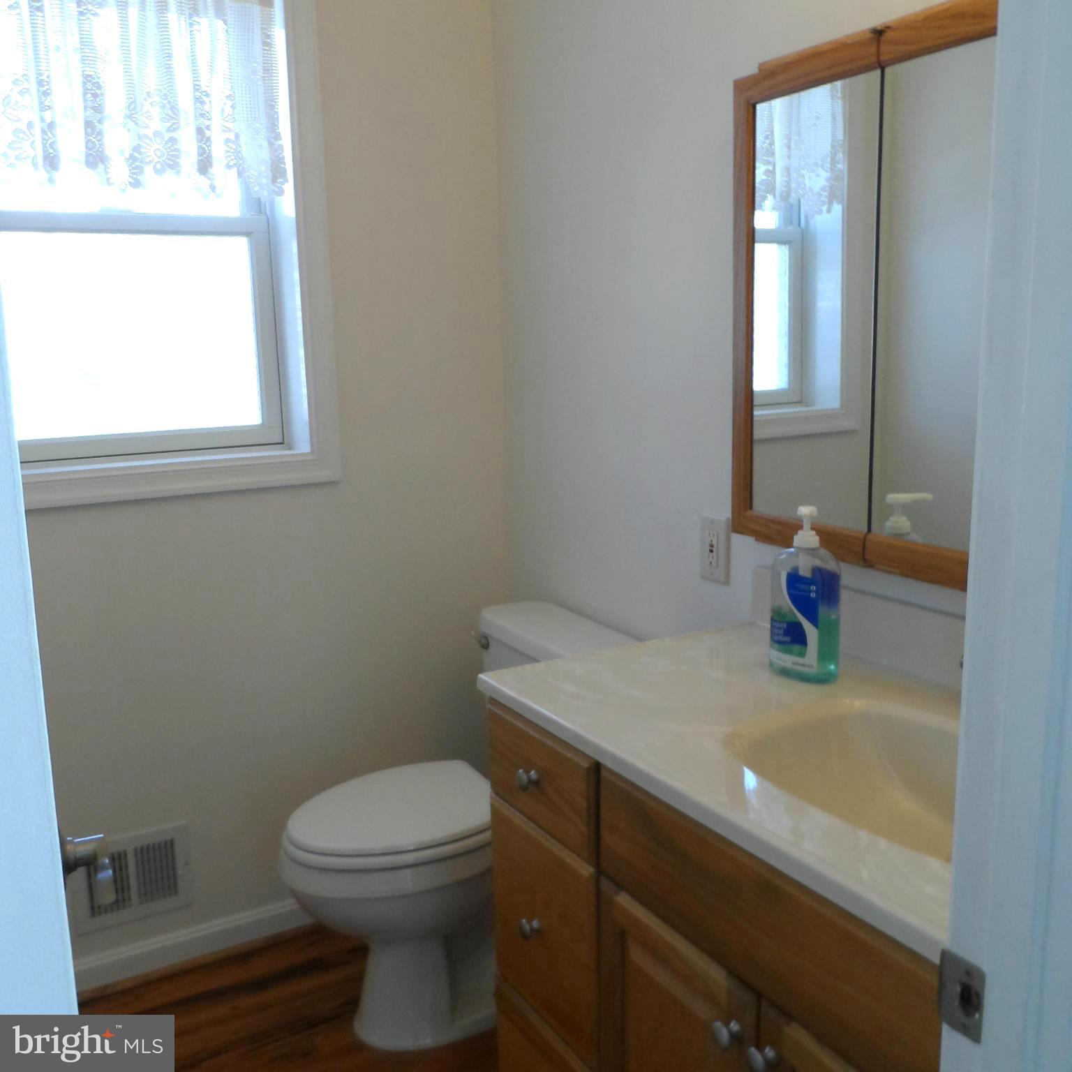 6607 Huntsman Boulevard Springfield, VA 22152 - Photo 10 of 30 Powder Room Off Kitchen
