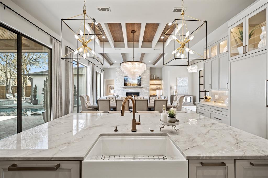 a room with lots of white furniture