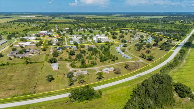 an aerial view of residential house with outdoor space