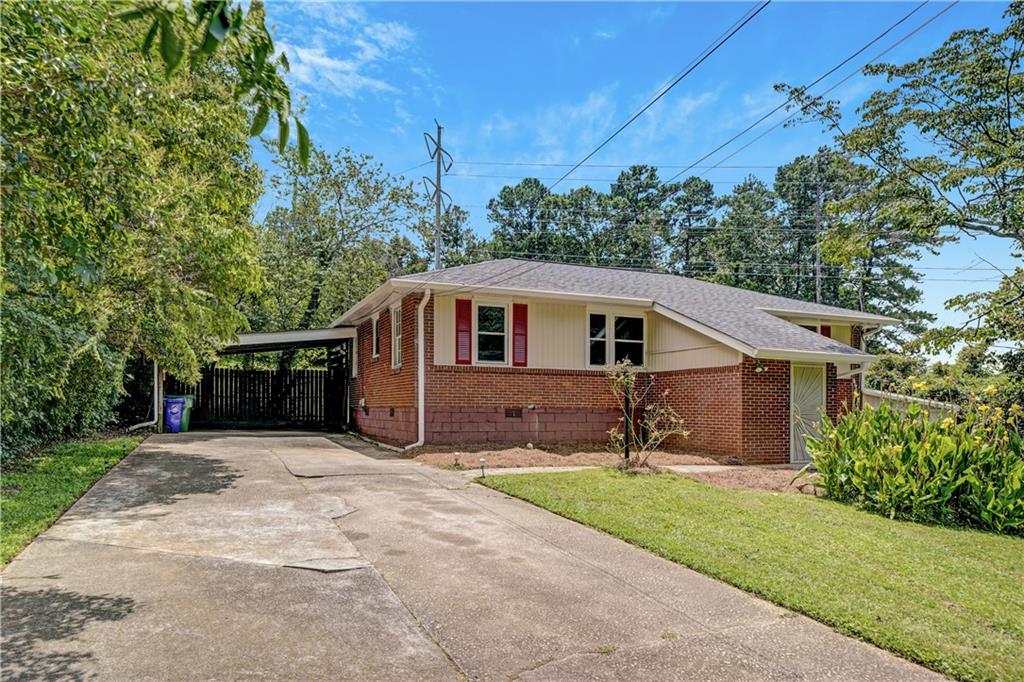 1073 Willivee Drive Decatur, GA 30033 - Photo 1 of 1 front view of house with a yard