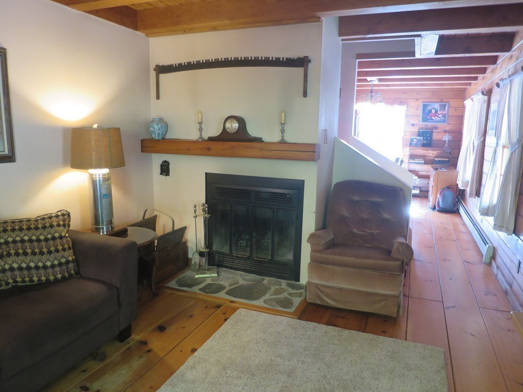 3189 Greenwich Road Hardwick, MA 01082 - Photo 13 of 27 a living room with furniture and a fireplace