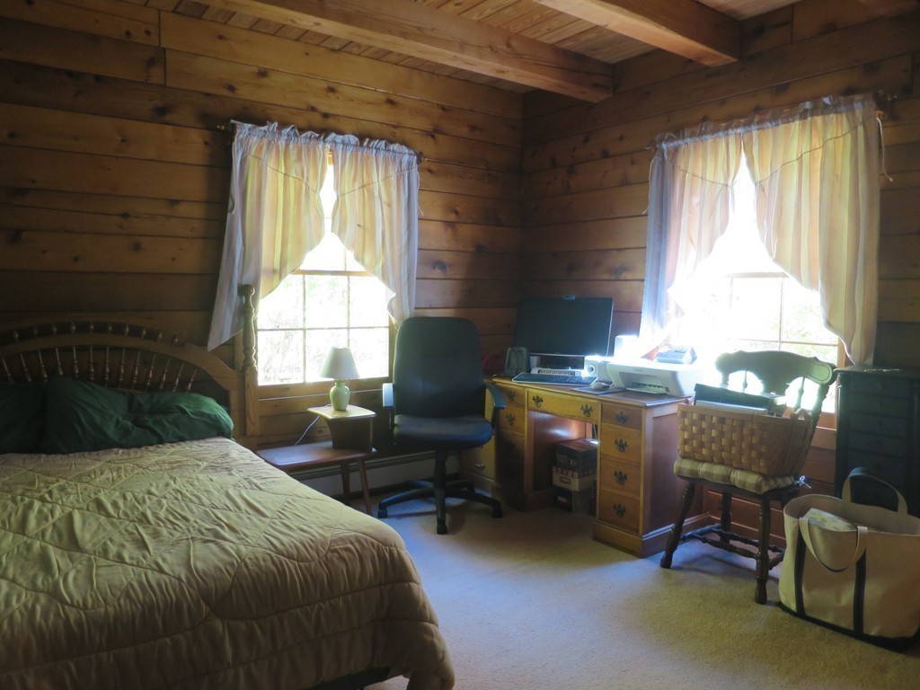 3189 Greenwich Road Hardwick, MA 01082 - Photo 16 of 27 a bedroom with a bed chair and window