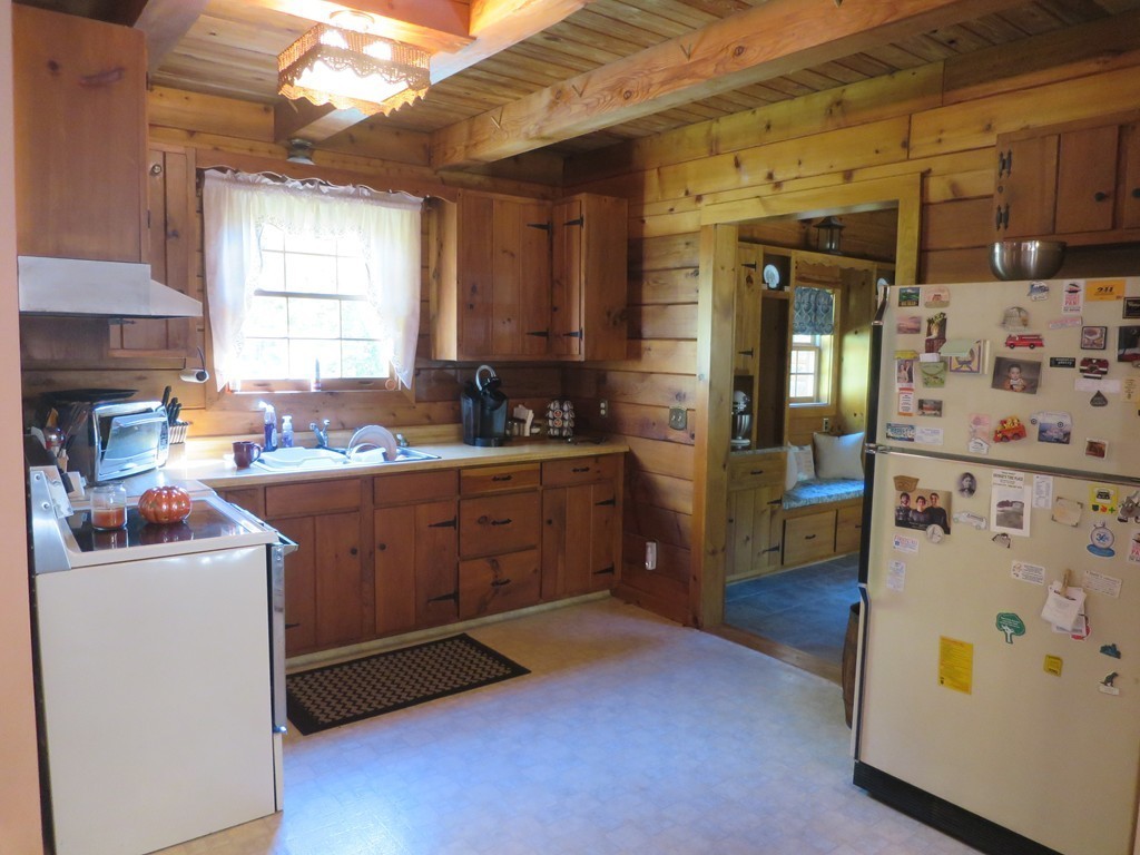 3189 Greenwich Road Hardwick, MA 01082 - Photo 5 of 27 a kitchen with sink cabinets and window