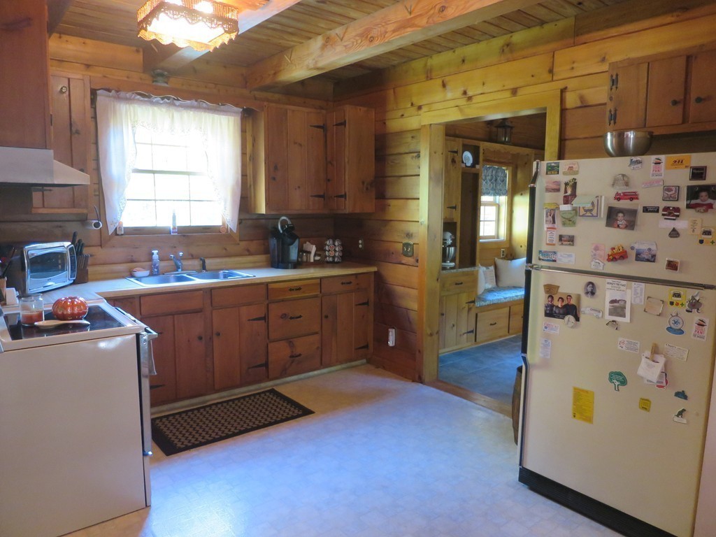 3189 Greenwich Road Hardwick, MA 01082 - Photo 6 of 27 a kitchen with sink cabinets and window