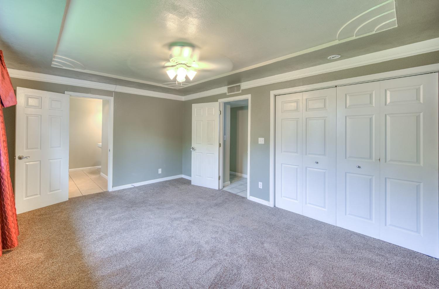 2170 Moir Drive Sanger, CA 93657 - Photo 17 of 22 a view of an empty room with a chandelier