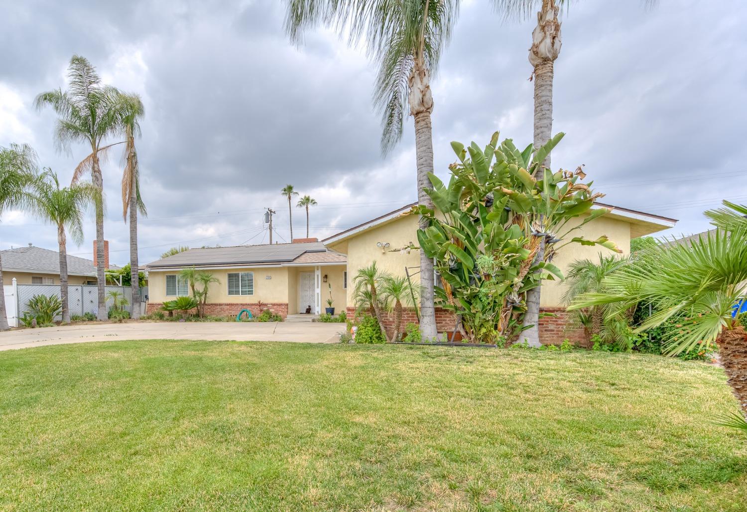 2170 Moir Drive Sanger, CA 93657 - Photo 22 of 22 a front view of a house with a yard