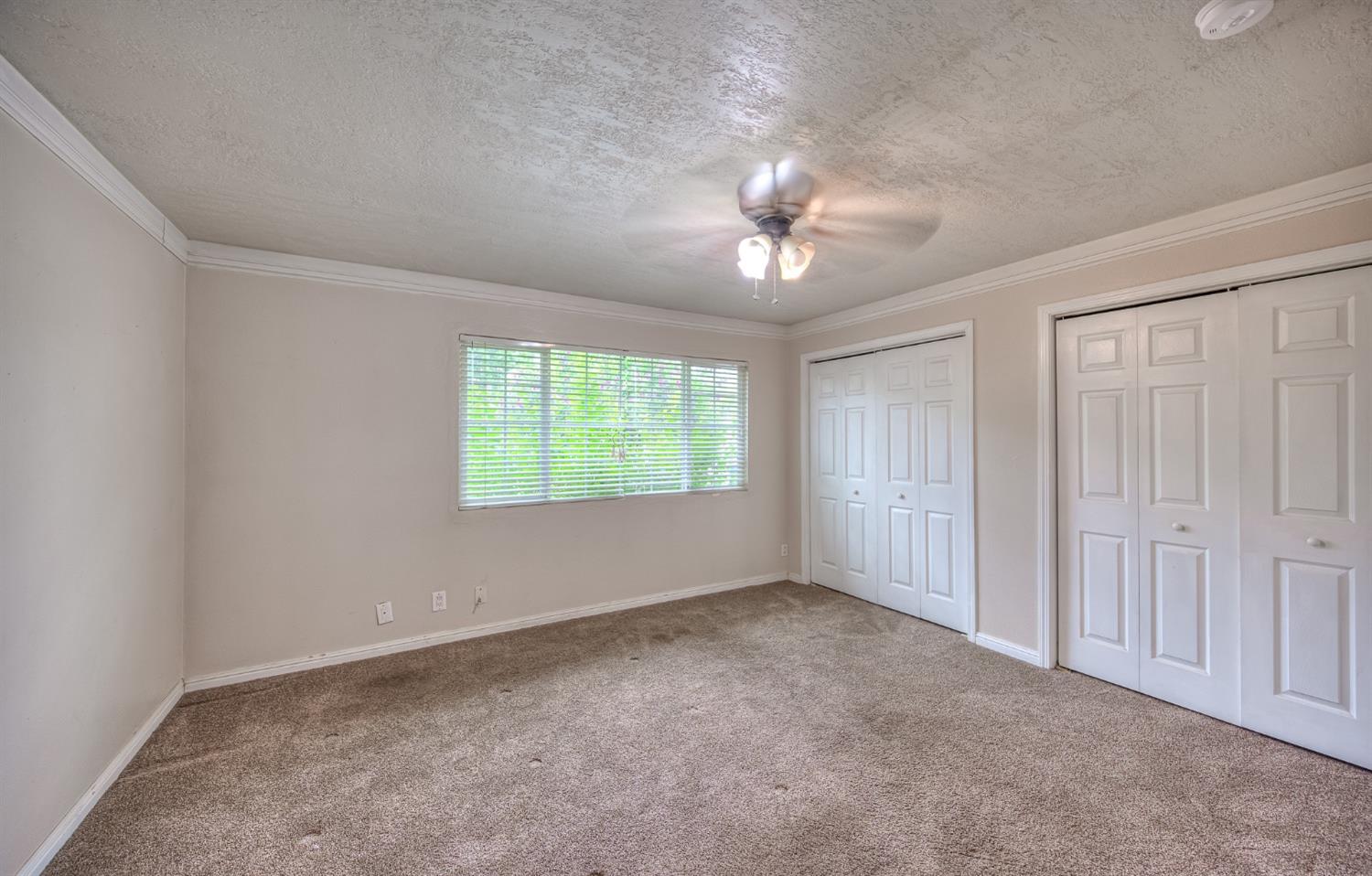 2170 Moir Drive Sanger, CA 93657 - Photo 10 of 22 a view of an empty room with a window