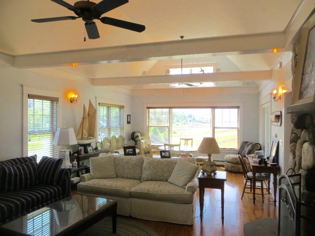 8 Tukey Lane Chamberlain, ME 04541 - Photo 15 of 20 Water side view of the great room,...