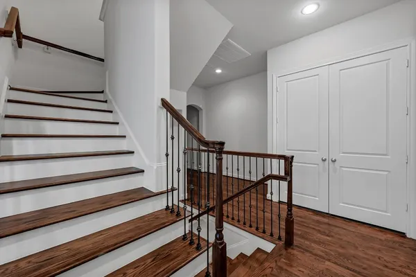 a view of entryway with wooden floor