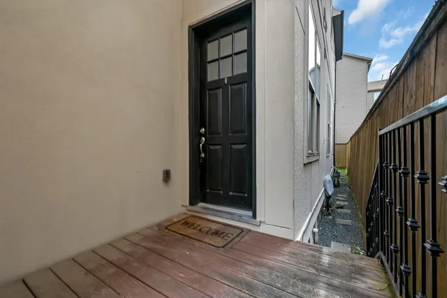 a view of livingroom with wooden floor and stairs