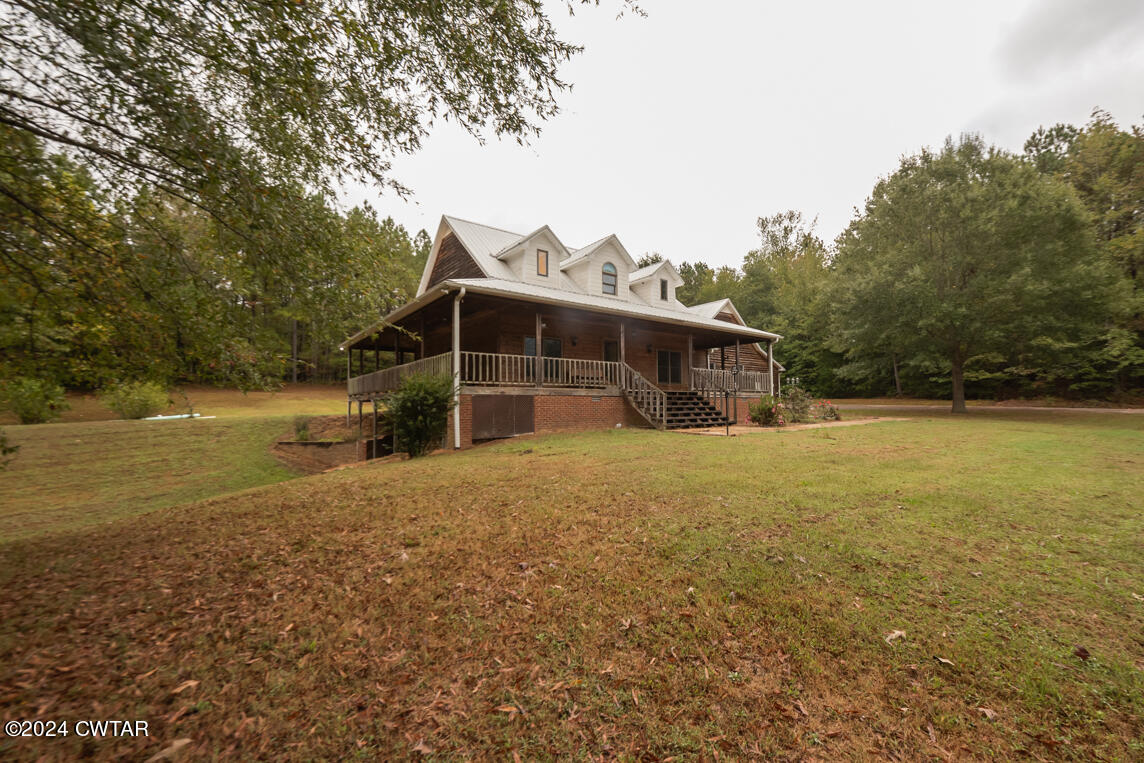 4392 Alberton Road Lexington, TN 38351 - Photo 11 of 75 a view of a house with a yard