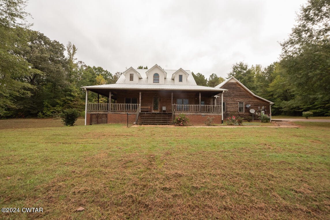 4392 Alberton Road Lexington, TN 38351 - Photo 12 of 75 a front view of a house with a yard