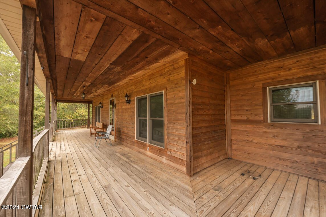 4392 Alberton Road Lexington, TN 38351 - Photo 13 of 75 a view of a backyard with wooden floor and iron stairs