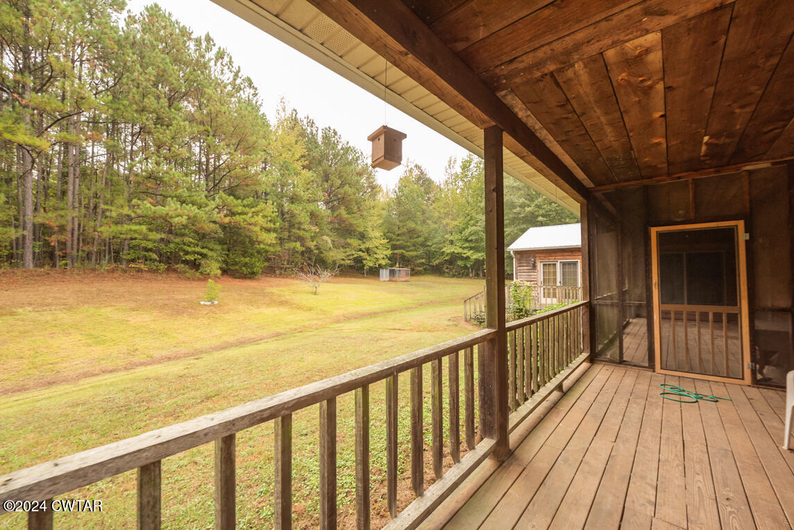 4392 Alberton Road Lexington, TN 38351 - Photo 17 of 75 a view of a balcony with wooden floor