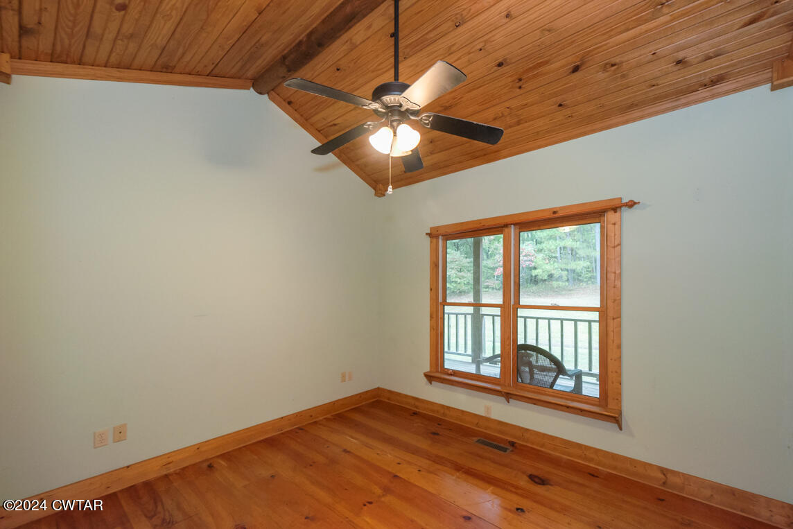 4392 Alberton Road Lexington, TN 38351 - Photo 26 of 75 a view of empty room with wooden floor and fan