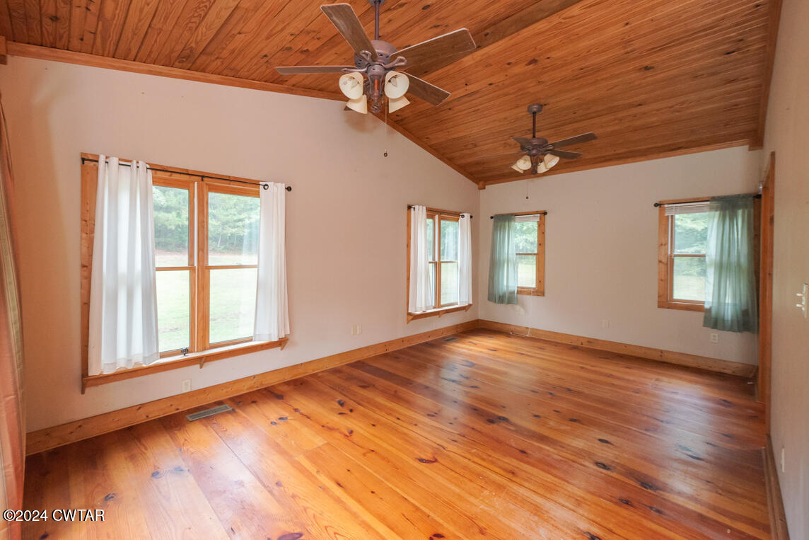 4392 Alberton Road Lexington, TN 38351 - Photo 31 of 75 a view of empty room with wooden floor and fan