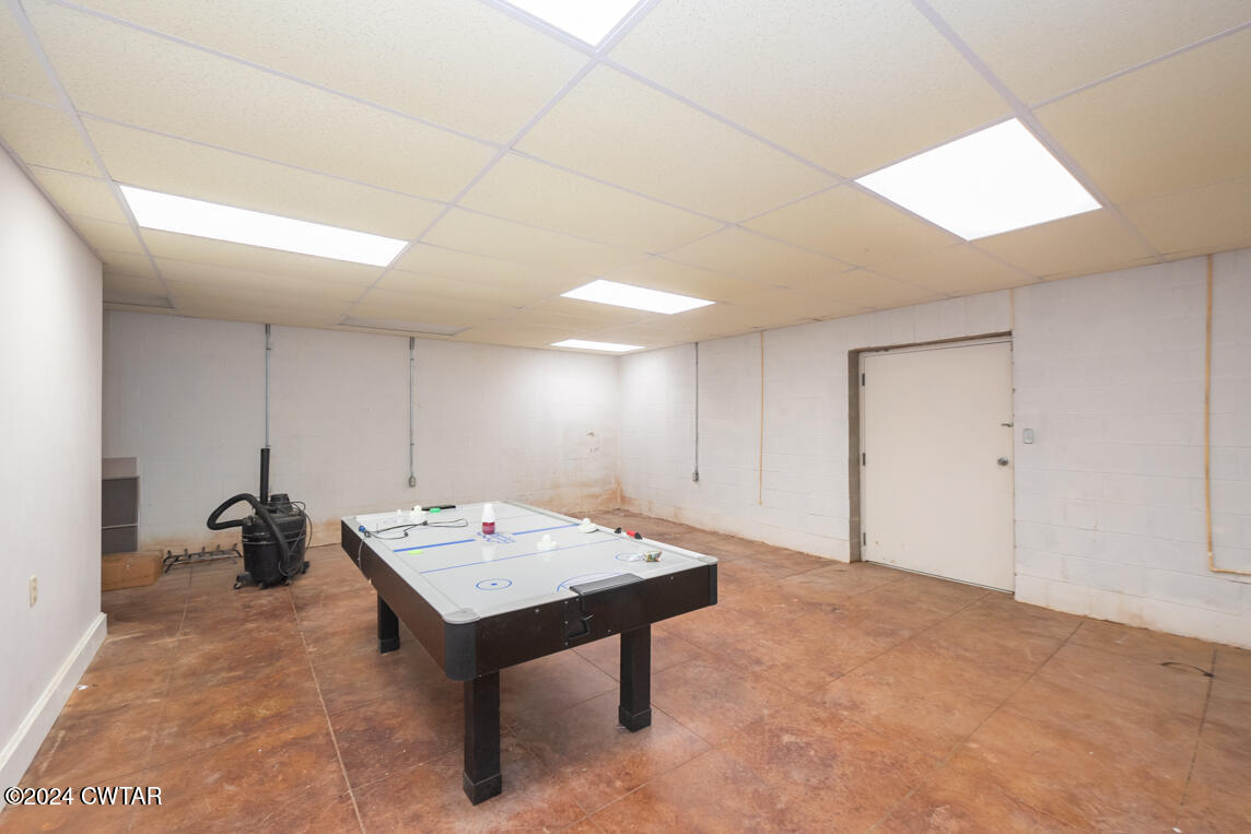 4392 Alberton Road Lexington, TN 38351 - Photo 48 of 75 a room with pool table and a rug