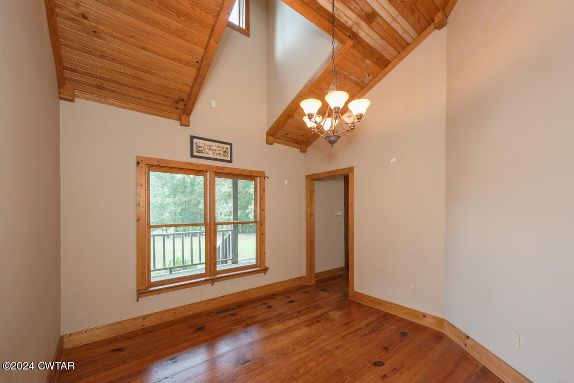 4392 Alberton Road Lexington, TN 38351 - Photo 51 of 75 a view of an empty room with a chandelier fan