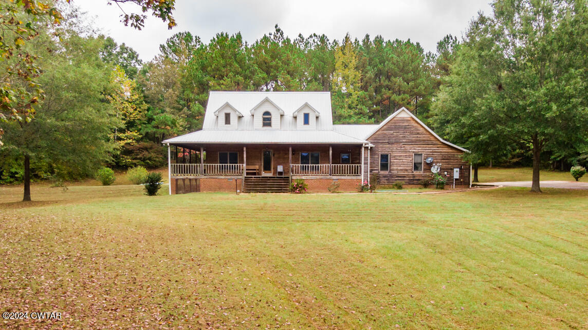 4392 Alberton Road Lexington, TN 38351 - Photo 53 of 75 a front view of a house with swimming pool