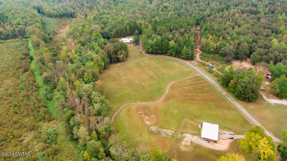 4392 Alberton Road Lexington, TN 38351 - Photo 66 of 75 a view of a swimming pool with an outdoor space