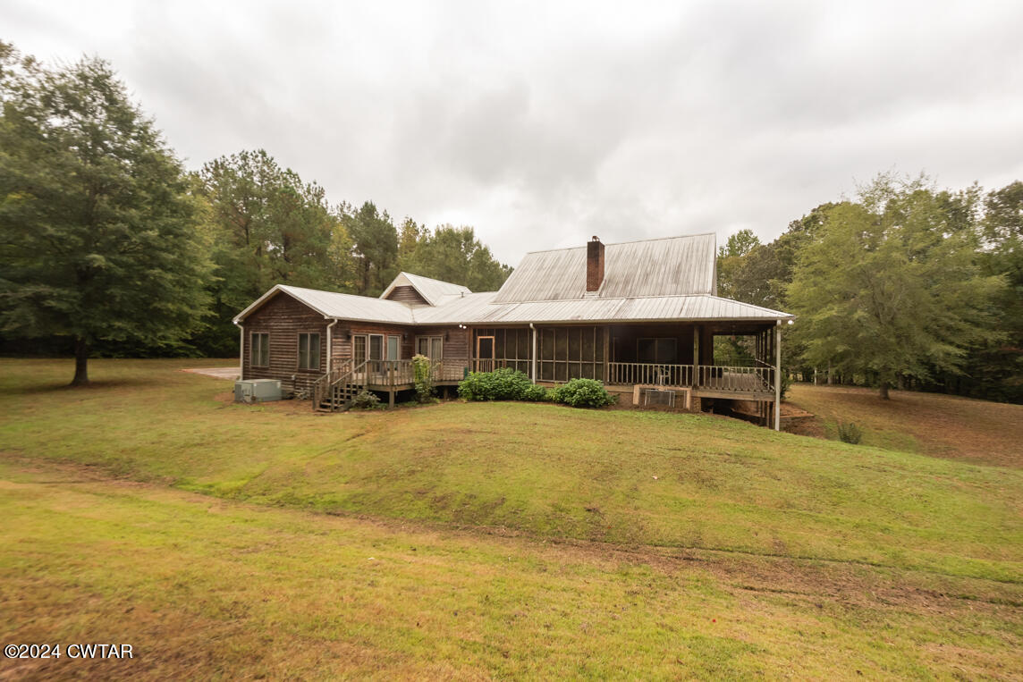 4392 Alberton Road Lexington, TN 38351 - Photo 8 of 75 a front view of a house with a yard