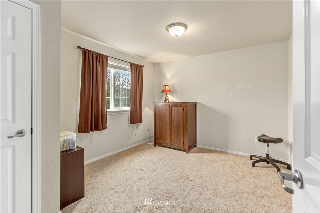 4313 147th Place Southeast Bothell, WA 98012 - Photo 21 of 29 a view of a livingroom with a workspace