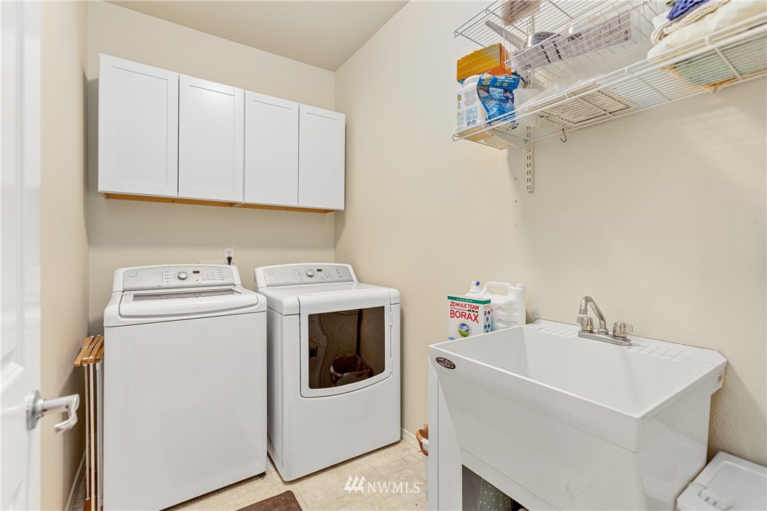 4313 147th Place Southeast Bothell, WA 98012 - Photo 25 of 29 a utility room with dryer and washer