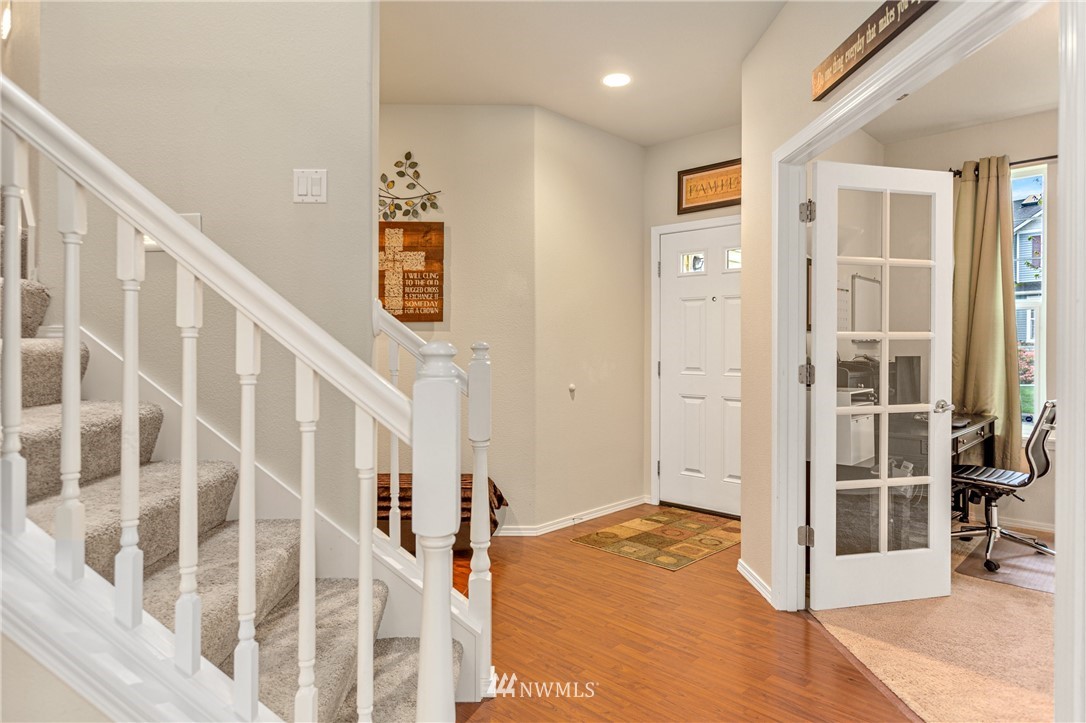 4313 147th Place Southeast Bothell, WA 98012 - Photo 5 of 29 a view of entryway with wooden floor