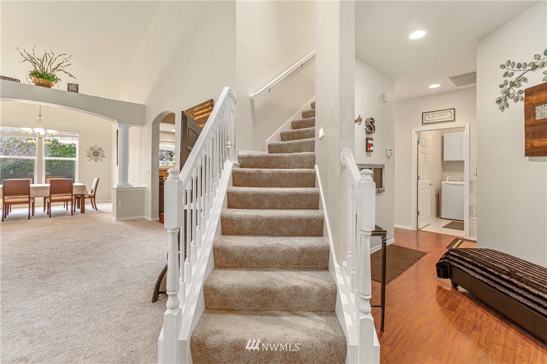 4313 147th Place Southeast Bothell, WA 98012 - Photo 7 of 29 a view of staircase with white walls and windows