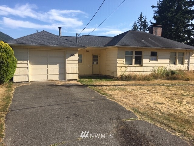 212 Viewcrest Road Bellingham, WA 98229 - Photo 1 of 1 a front view of a house with a yard